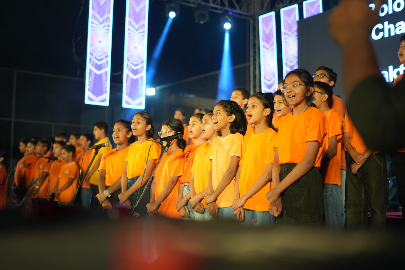 Students performing on stage